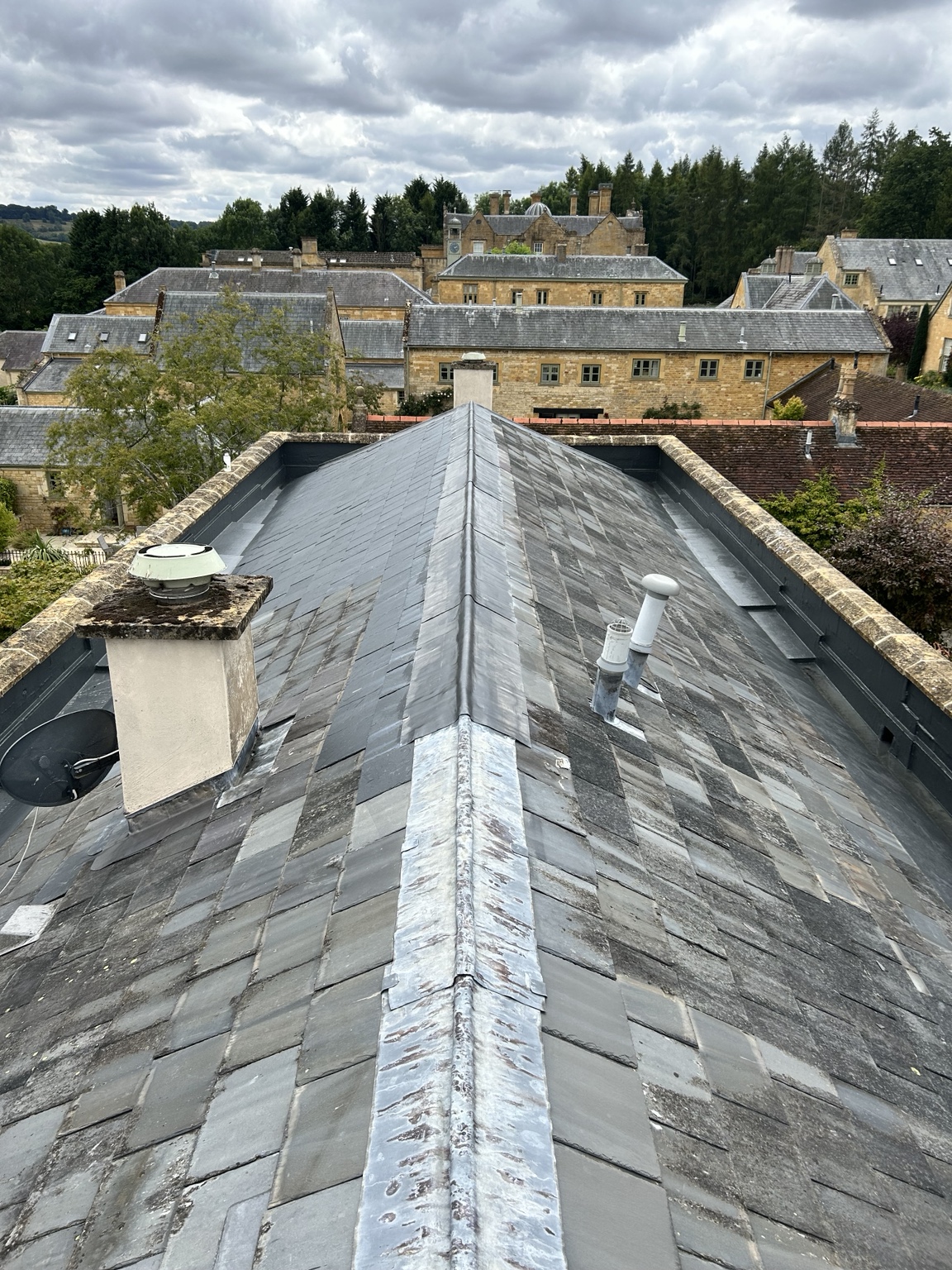 Lead-covered roof ridge and parapet junction